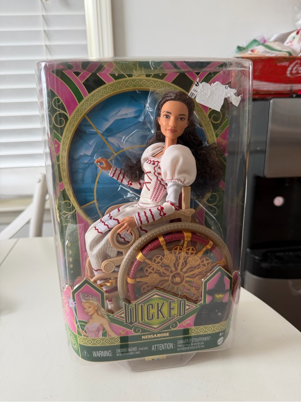 Wicked Nessarose Doll in White and Pink Wheelchair - Official Collectible